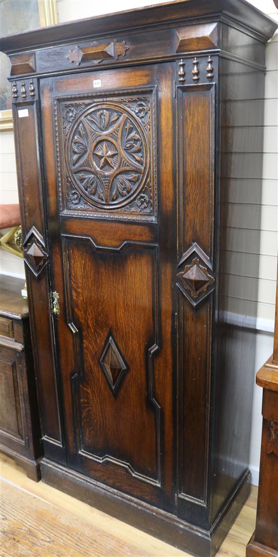 A 1920s oak hall cupboard, H.200cm